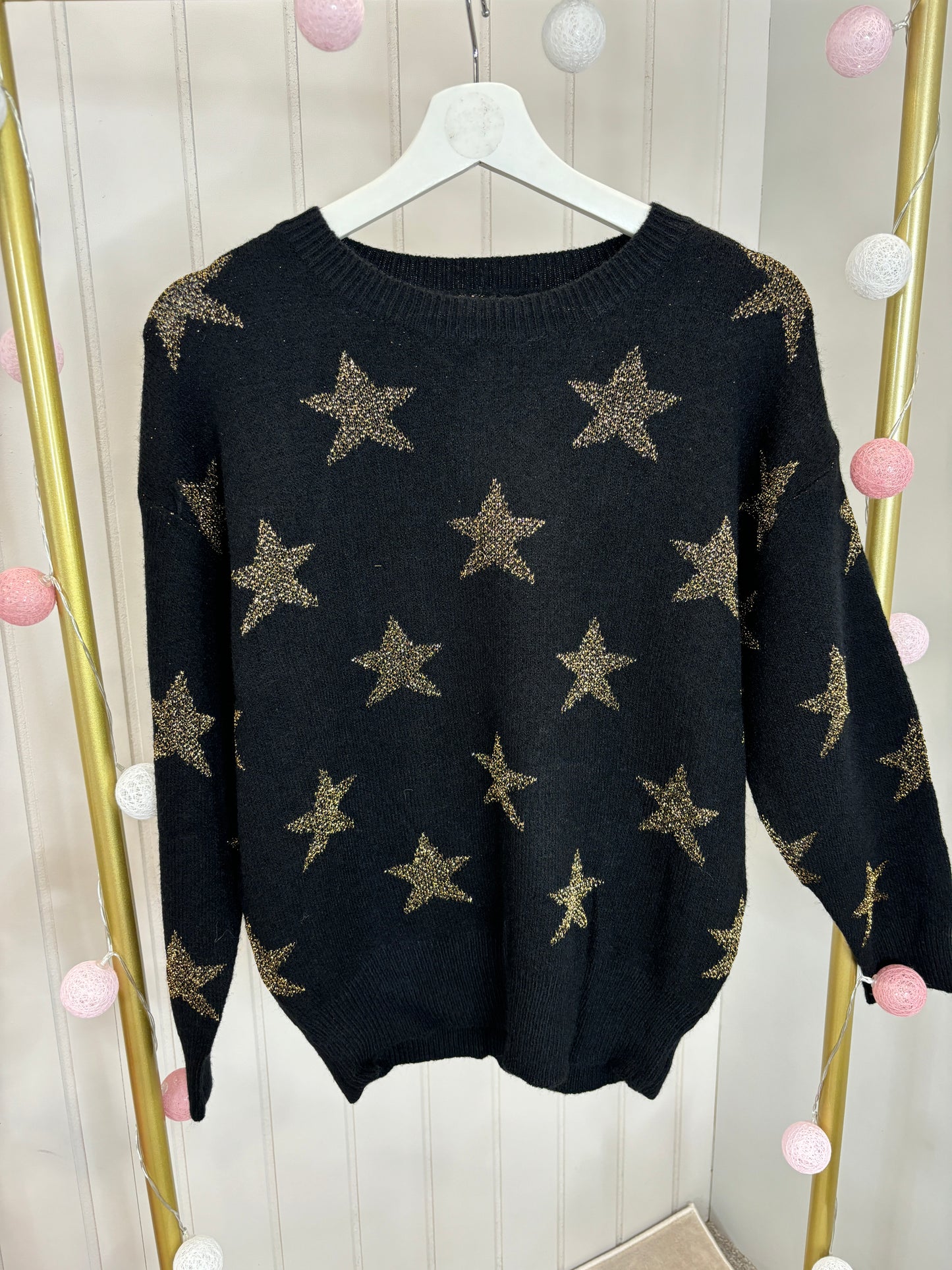 Black star knitted jumper